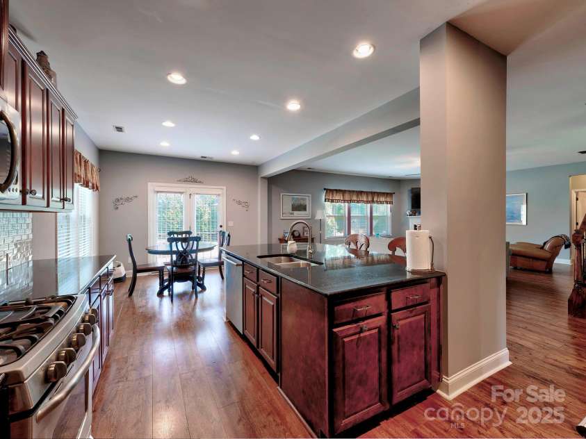 9622 Harvest Pond Avenue, Concord, NC 28027.  MLS# CAR4242006, YatesRealty ID 13192. Huge island with granite countertops