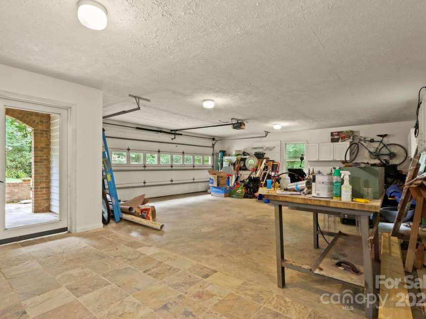 127 Boulder Lane, Blowing Rock, NC 28605.  MLS# CAR4290340, YatesRealty ID 13205. Oversized two-car garage