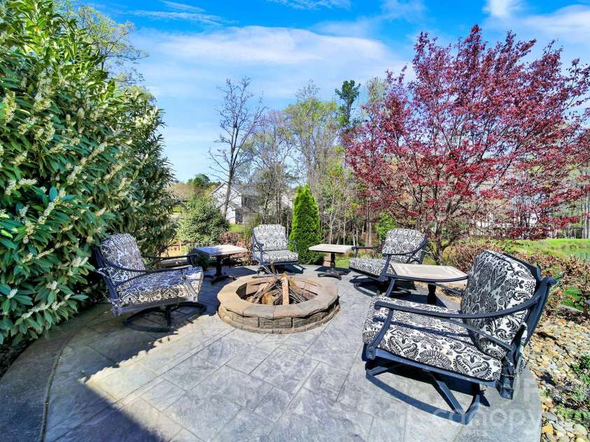 146 Cole Drive, Mooresville, NC 28115.  MLS# CAR4360351, YatesRealty ID 13207. Firepit