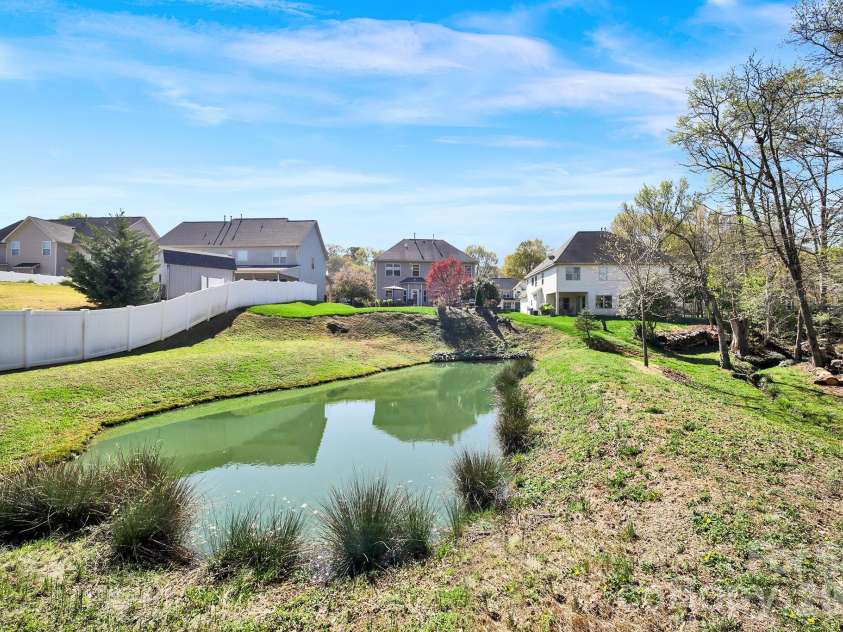 146 Cole Drive, Mooresville, NC 28115.  MLS# CAR4360351, YatesRealty ID 13207. Pond Views