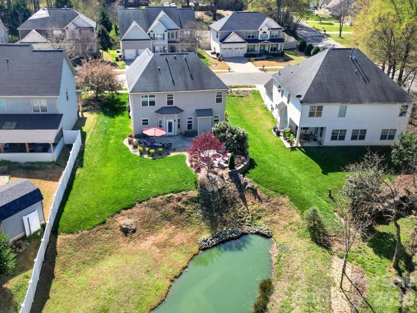 146 Cole Drive, Mooresville, NC 28115.  MLS# CAR4360351, YatesRealty ID 13207. Scenic Backyard