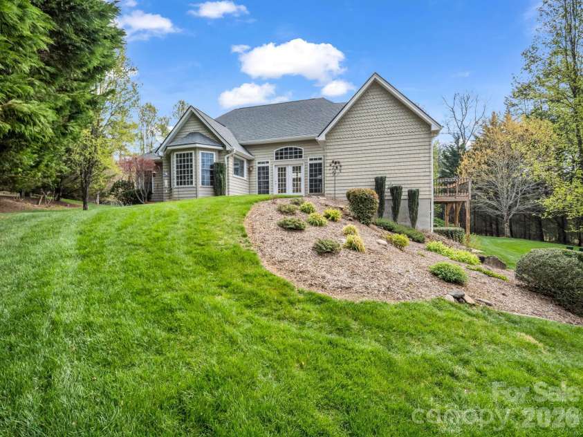 21 Kanuga Forest Drive, Hendersonville, NC 28739.  MLS# CAR4350082, YatesRealty ID 13208. 