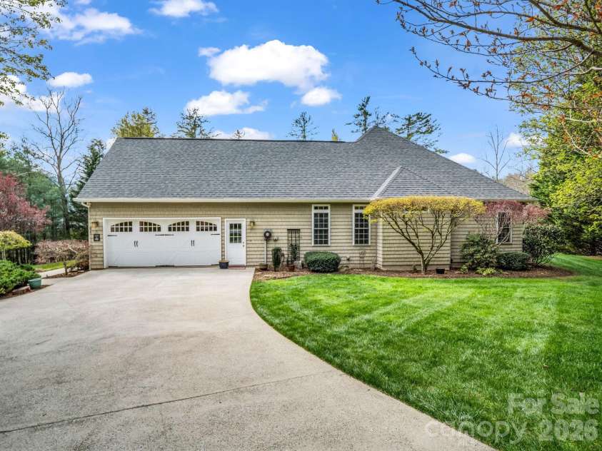 21 Kanuga Forest Drive, Hendersonville, NC 28739.  MLS# CAR4350082, YatesRealty ID 13208. 
