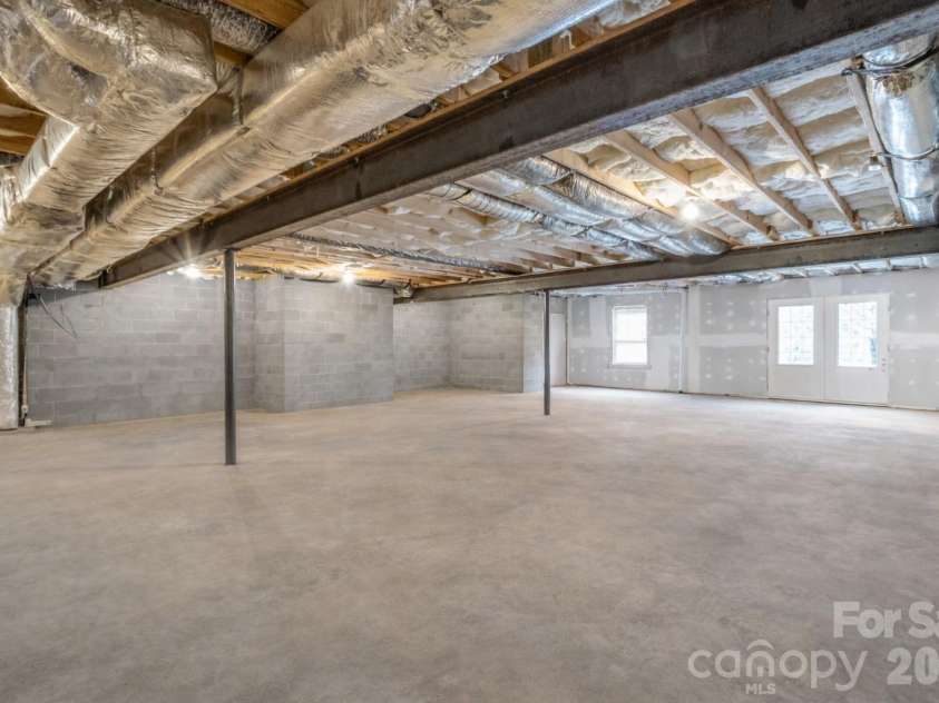 21 Kanuga Forest Drive, Hendersonville, NC 28739.  MLS# CAR4350082, YatesRealty ID 13208. Basement cleaned out using Ai