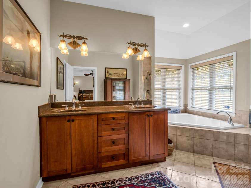 21 Kanuga Forest Drive, Hendersonville, NC 28739.  MLS# CAR4350082, YatesRealty ID 13208. Primary Bathroom