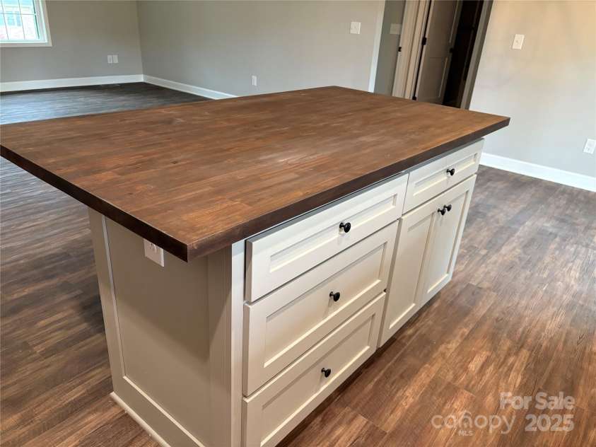8222 Madison Lane, Hickory, NC 28602.  MLS# CAR4256191, YatesRealty ID 13208. Kitchen island