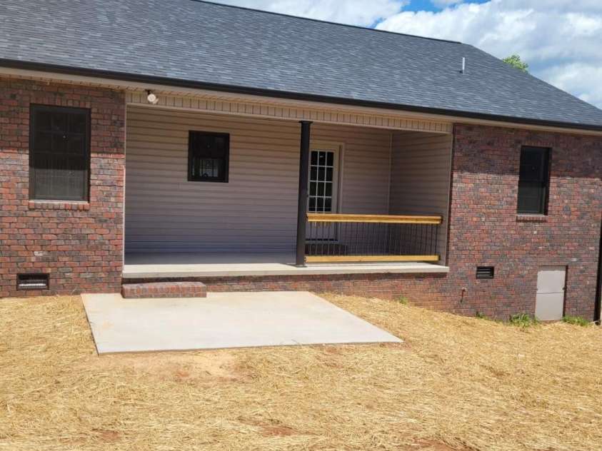 8222 Madison Lane, Hickory, NC 28602.  MLS# CAR4256191, YatesRealty ID 13208. Rear with covered porch