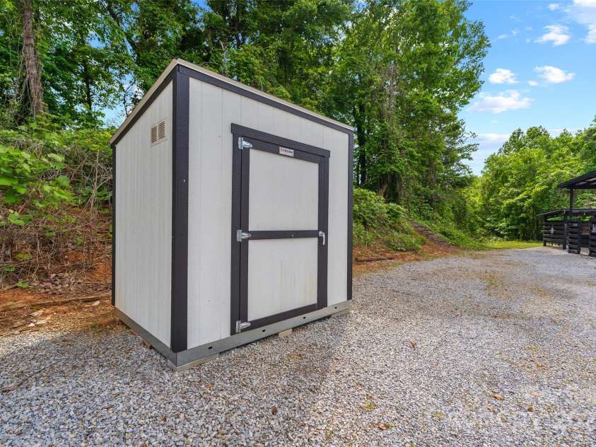 787 Ridge Road, Marion, NC 28752.  MLS# CAR4257578, YatesRealty ID 13209. Extra storage shed located between MAC + MINI in driveway area