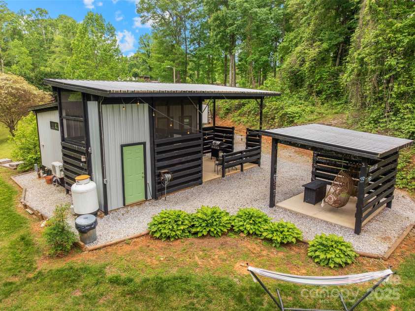 787 Ridge Road, Marion, NC 28752.  MLS# CAR4257578, YatesRealty ID 13209. MAC - Back side view with extra storage