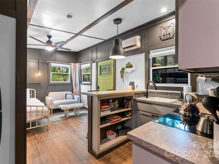 787 Ridge Road, Marion, NC 28752.  MLS# CAR4257578, YatesRealty ID 13209. MAC - kitchen view open to Studio Bedroom space