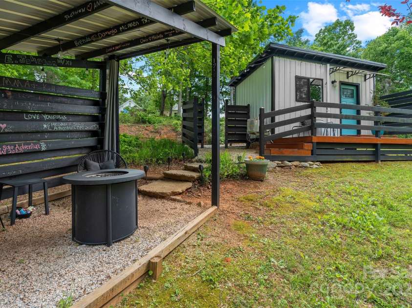 787 Ridge Road, Marion, NC 28752.  MLS# CAR4257578, YatesRealty ID 13209. MINI - Detached patio area fire pit