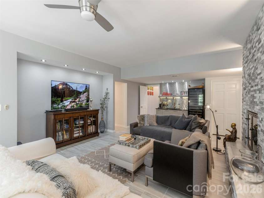 30 Fairway Drive, Etowah, NC 28729.  MLS# CAR4342625, YatesRealty ID 1321. Family room
