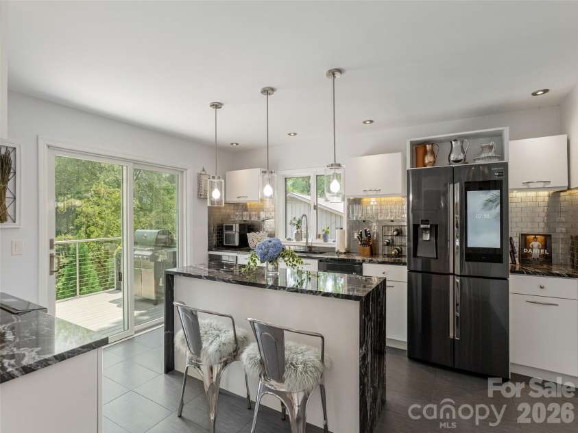 30 Fairway Drive, Etowah, NC 28729.  MLS# CAR4342625, YatesRealty ID 1321. Kitchen with island