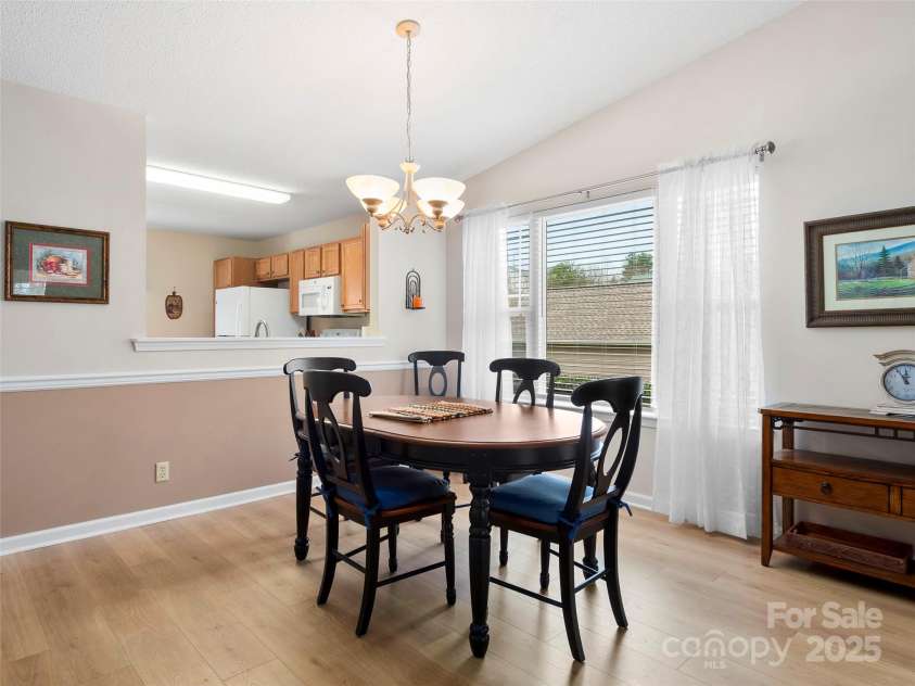 3901 Wood Duck Way, Hendersonville, NC 28792.  MLS# CAR4328986, YatesRealty ID 13213. Spacious Open Dining Area With Pass-Through Kitchen Window