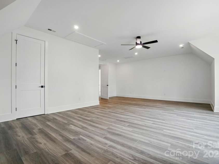 149 Shady Cove Road, Troutman, NC 28166.  MLS# CAR4252387, YatesRealty ID 13223. Bonus room includes walk-in closet storage
