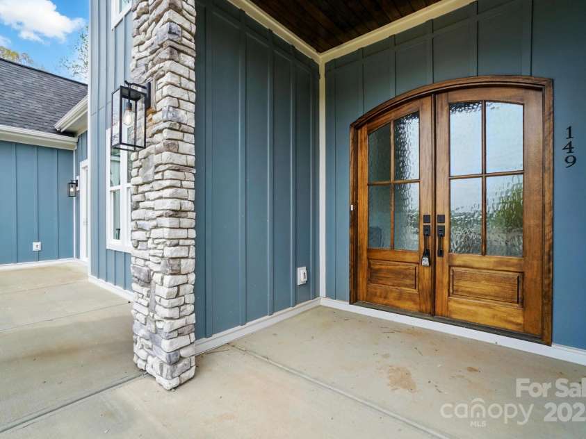 149 Shady Cove Road, Troutman, NC 28166.  MLS# CAR4252387, YatesRealty ID 13223. French front door entry