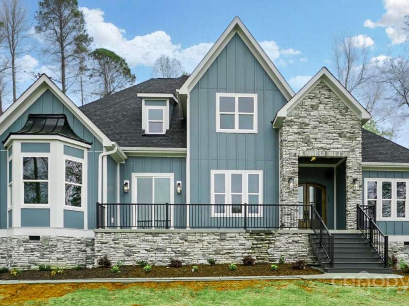 149 Shady Cove Road, Troutman, NC 28166.  MLS# CAR4252387, YatesRealty ID 13223. Lake view from front porch!