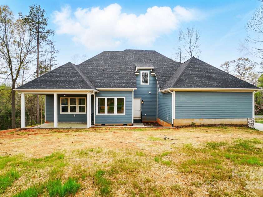 149 Shady Cove Road, Troutman, NC 28166.  MLS# CAR4252387, YatesRealty ID 13223. Spacious back yard