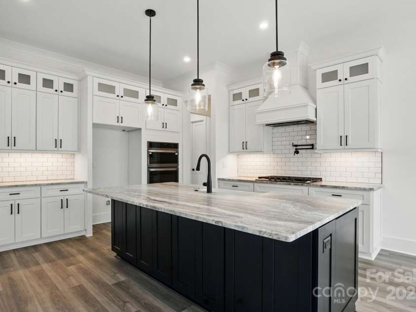 149 Shady Cove Road, Troutman, NC 28166.  MLS# CAR4252387, YatesRealty ID 13223. Stunning kitchen impeccably styled