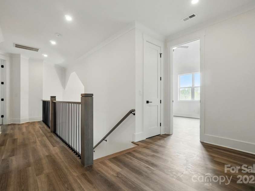 149 Shady Cove Road, Troutman, NC 28166.  MLS# CAR4252387, YatesRealty ID 13223. Upstairs hall landing