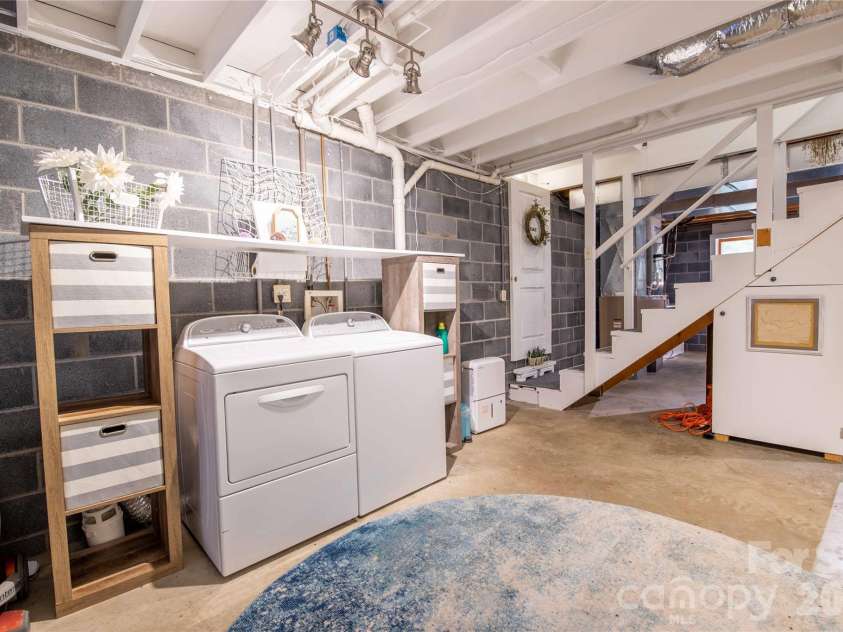 348 Dandelion Lane, Burnsville, NC 28714.  MLS# CAR4340112, YatesRealty ID 13223. Basement with Laundry 