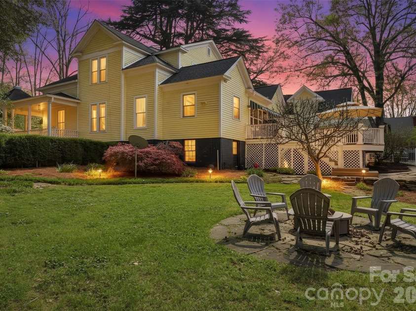 8 Vance Street, Lexington, NC 27292.  MLS# CAR4369214, YatesRealty ID 13224. Fire pit in back yard