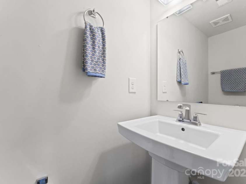 3003 Salix Bend Drive, Charlotte, NC 28205.  MLS# CAR4257314, YatesRealty ID 13225. Lower level powder room
