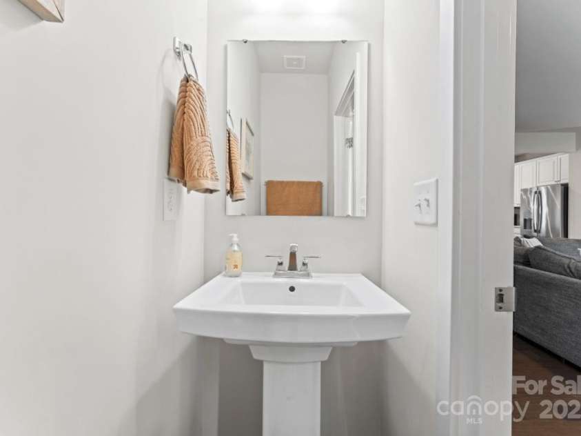 3003 Salix Bend Drive, Charlotte, NC 28205.  MLS# CAR4257314, YatesRealty ID 13225. Main level powder room
