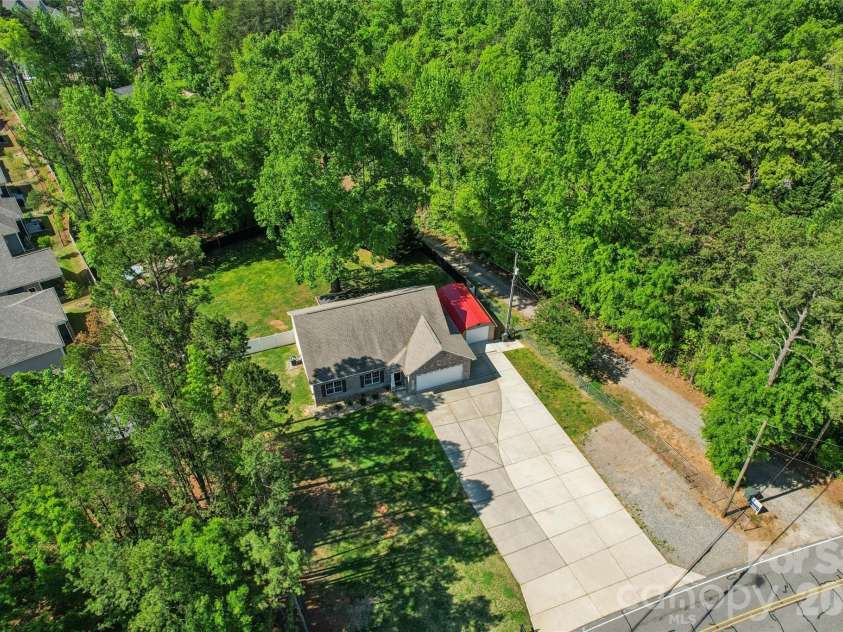 3063 Eva Drive, Concord, NC 28027.  MLS# CAR4369639, YatesRealty ID 13229. 