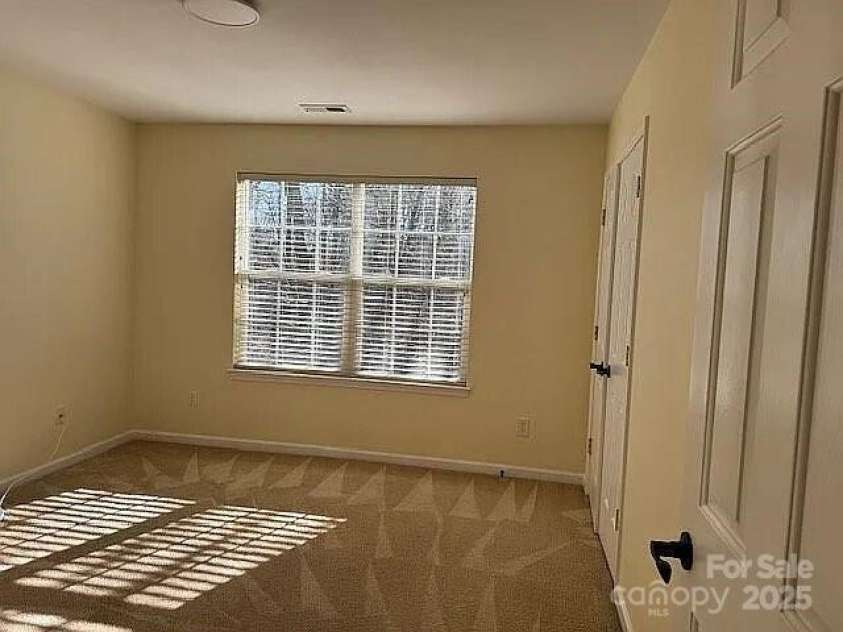 1043 Boxelder Lane, Charlotte, NC 28262.  MLS# CAR4225098, YatesRealty ID 13237. Bedroom 1