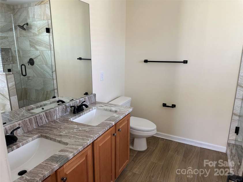 1043 Boxelder Lane, Charlotte, NC 28262.  MLS# CAR4225098, YatesRealty ID 13237. Master Bathroom