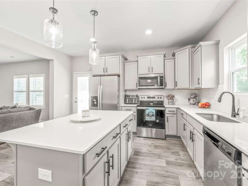 73 Sweet Peach Lane, Peachland, NC 28133.  MLS# CAR4210492, YatesRealty ID 13240. Kitchen with Large Island