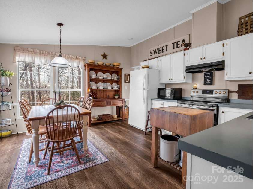243 Buffalo Creek Road, Lake Lure, NC 28746.  MLS# CAR4219032, YatesRealty ID 13241. Expansive eat-in kitchen.