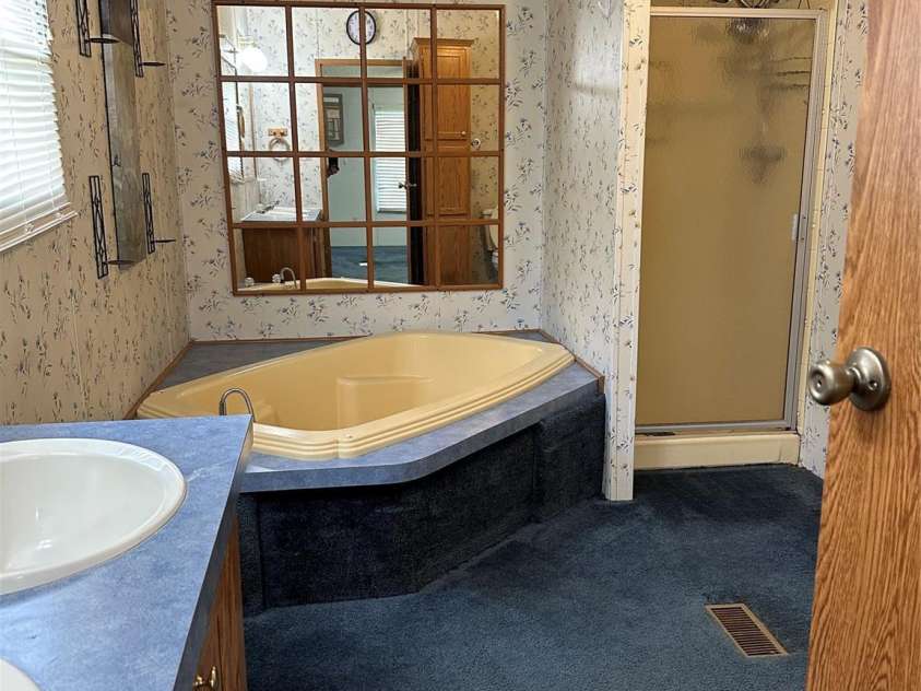 51 Kings Drive, Taylorsville, NC 28681.  MLS# CAR4245754, YatesRealty ID 13242. Guest bath with walk-in jacuzzi tub