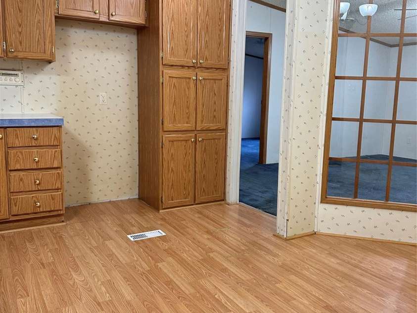 51 Kings Drive, Taylorsville, NC 28681.  MLS# CAR4245754, YatesRealty ID 13242. Kitchen with eat in dining area