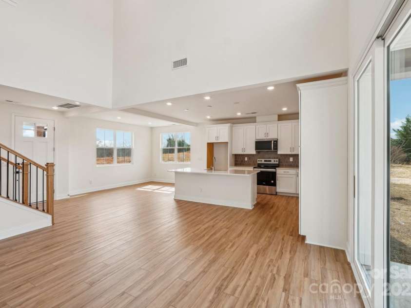 809 Terra Drive, Tega Cay, SC 29708.  MLS# CAR4195842, YatesRealty ID 13244. Great Room View to Kitchen/Dining