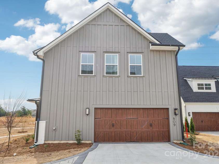 809 Terra Drive, Tega Cay, SC 29708.  MLS# CAR4195842, YatesRealty ID 13244. Side View of Home