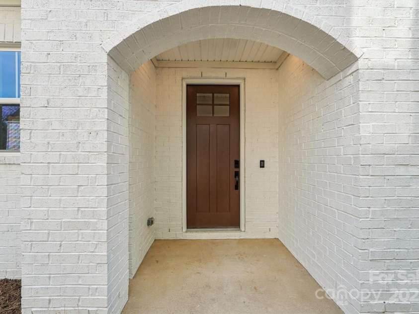 817 Terra Drive, Tega Cay, SC 29708.  MLS# CAR4195740, YatesRealty ID 13246. Example Courtyard Rendering