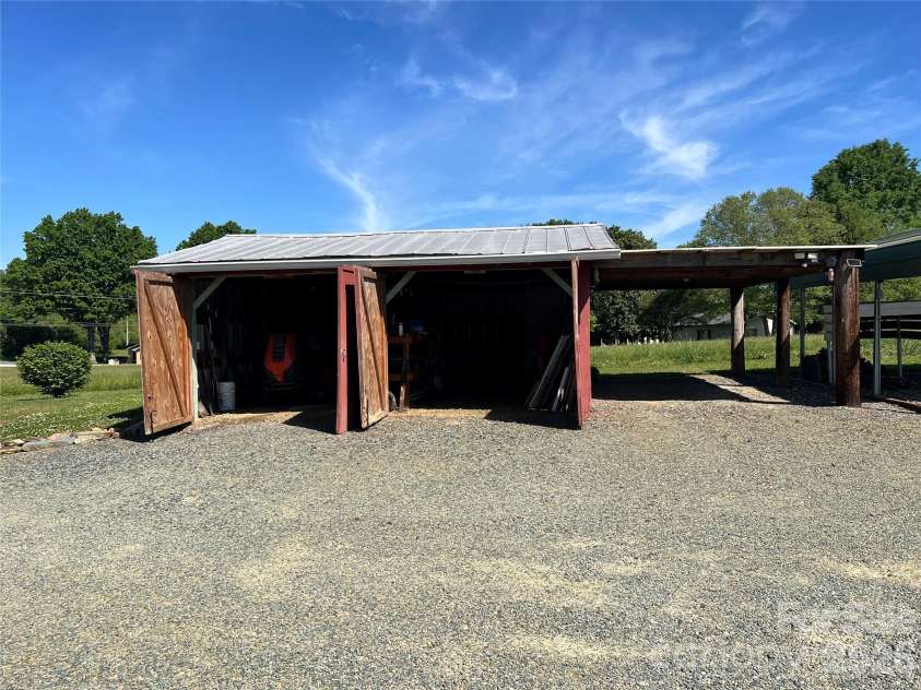 24530 Ridgecrest Road, Locust, NC 28097.  MLS# CAR4369926, YatesRealty ID 13247. 