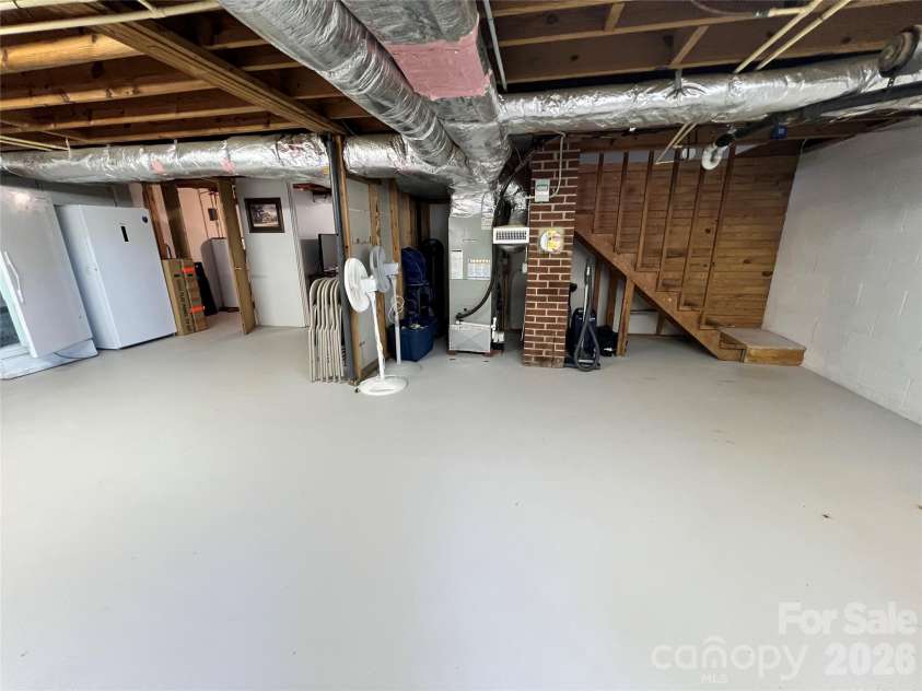 24530 Ridgecrest Road, Locust, NC 28097.  MLS# CAR4369926, YatesRealty ID 13247. Basement