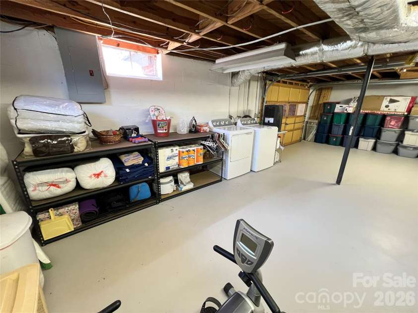 24530 Ridgecrest Road, Locust, NC 28097.  MLS# CAR4369926, YatesRealty ID 13247. Basement - Laundry Area