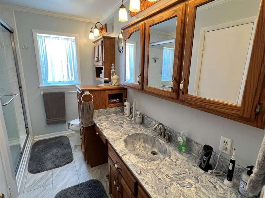 24530 Ridgecrest Road, Locust, NC 28097.  MLS# CAR4369926, YatesRealty ID 13247. Bathroom 