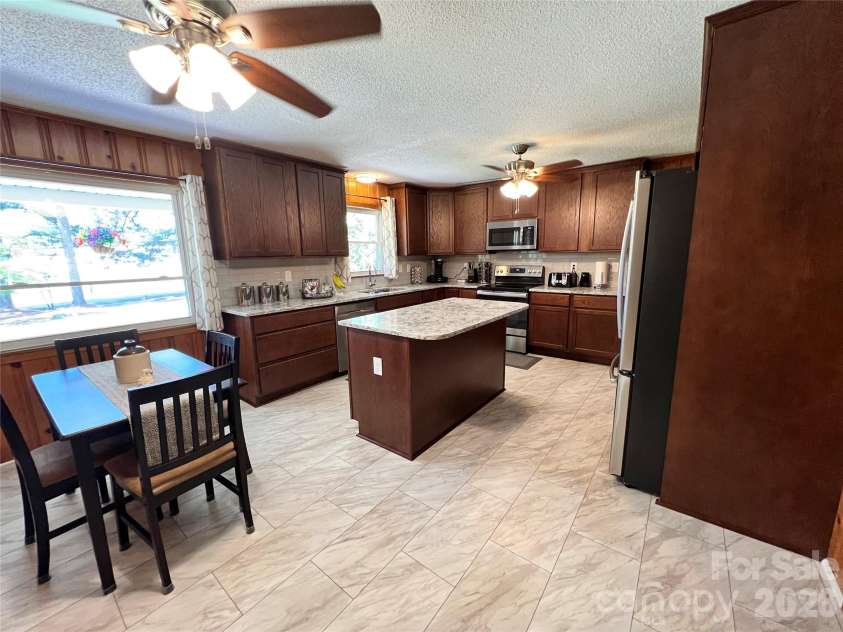 24530 Ridgecrest Road, Locust, NC 28097.  MLS# CAR4369926, YatesRealty ID 13247. Kitchen/Breakfast Area
