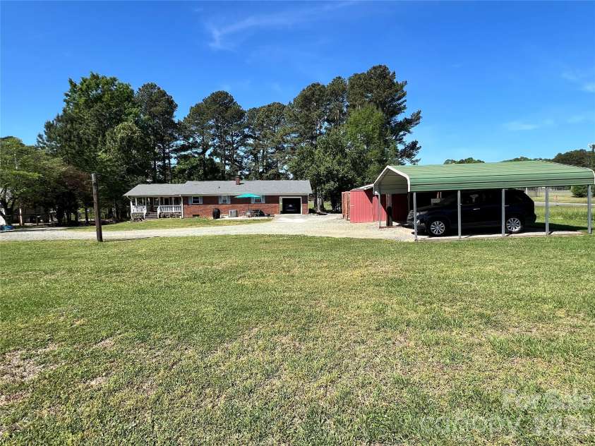 24530 Ridgecrest Road, Locust, NC 28097.  MLS# CAR4369926, YatesRealty ID 13247. Rear View 
