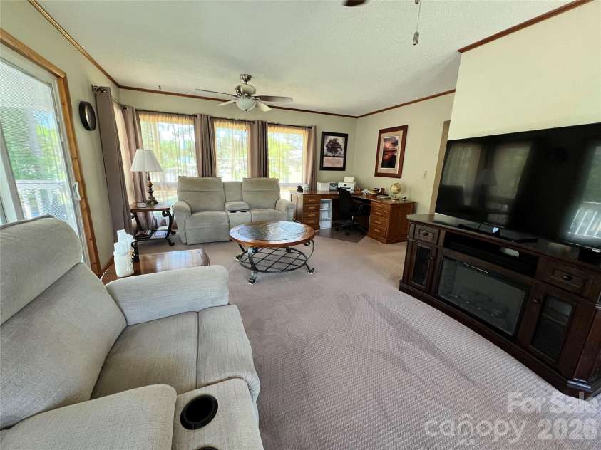 24530 Ridgecrest Road, Locust, NC 28097.  MLS# CAR4369926, YatesRealty ID 13247. Sunporch/Living Room