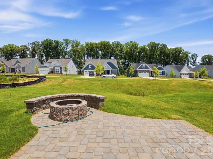 2038 Mantle Ridge Drive, Indian Trail, NC 28079.  MLS# CAR4368327, YatesRealty ID 13249. Paver patio and firepit
