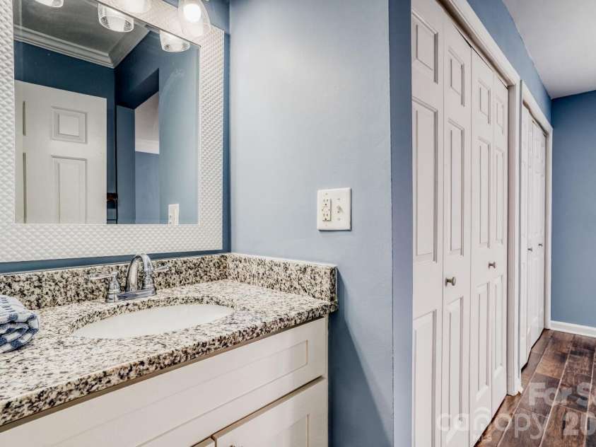 417 Church Street, Charlotte, NC 28202.  MLS# CAR4358979, YatesRealty ID 13254. Bathroom features two seperate sink areas. 