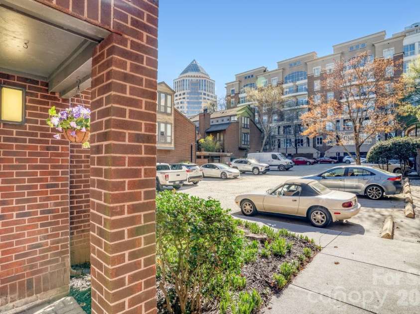 417 Church Street, Charlotte, NC 28202.  MLS# CAR4358979, YatesRealty ID 13254. Your assigned parking spot is just outside your front door. 