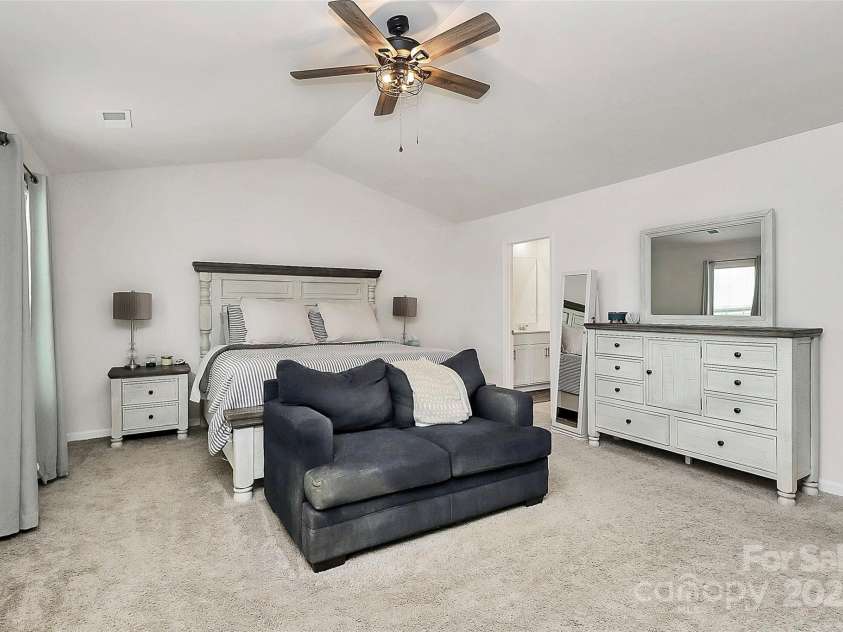 9203 Mackinaw Drive, Gastonia, NC 28056.  MLS# CAR4221927, YatesRealty ID 13254. Spacious Primary Bedroom