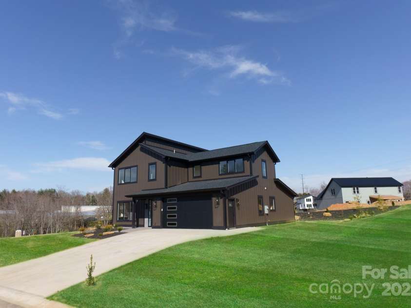 97 Scott Meadows Drive, Asheville, NC 28806.  MLS# CAR4238193, YatesRealty ID 13255. Grass virtually enhanced